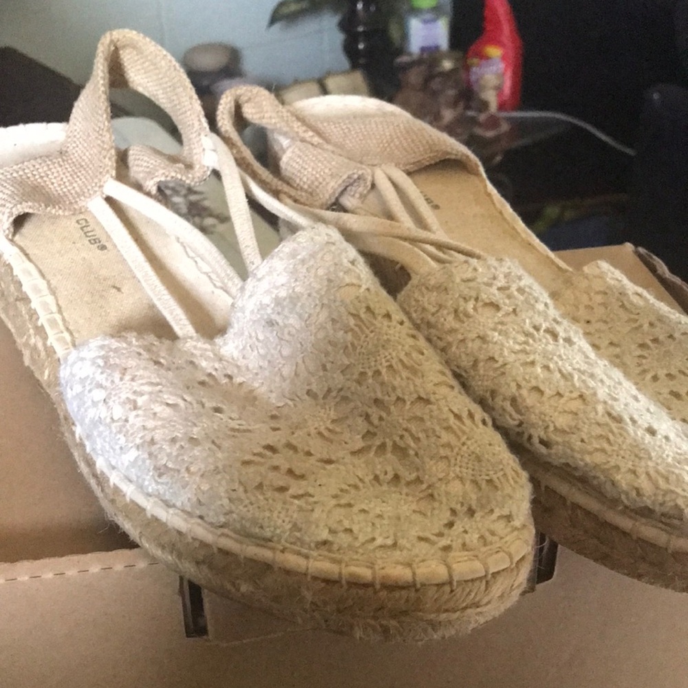 Beige colored espadrilles wedge heels..worn a couple of times sz 10..